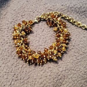 Brown and gold beaded bracelet.